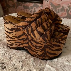 Awesome platform slides wear in winter or summer